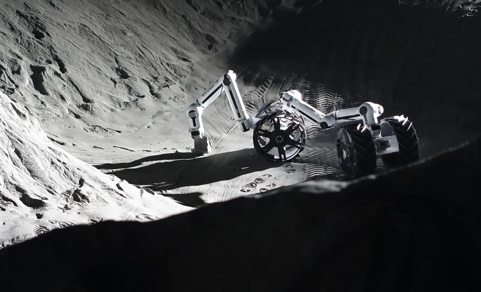 Dragon configuration in a regolith crater, DLR-ESA LUNA facility, Cologne.