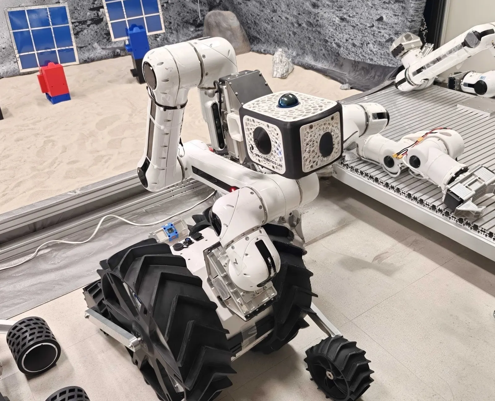 The sensor box mounted on a MoonBot on the lab sand bed, Space Robotics Lab, Tohoku University.